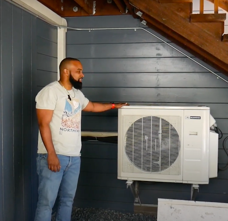 Reymon next to heat pump