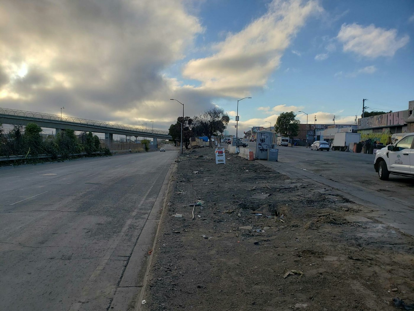 Median clear of debris with cloudy sky