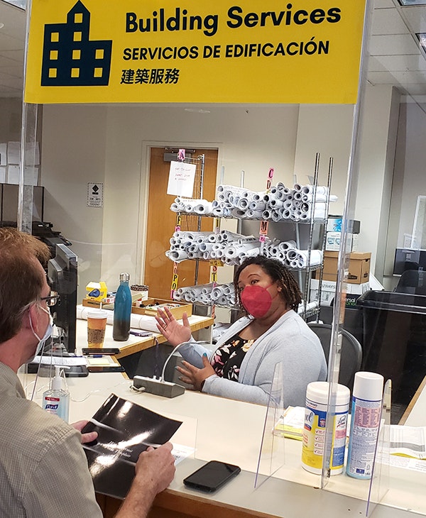 Photo of customer at Permit Counter