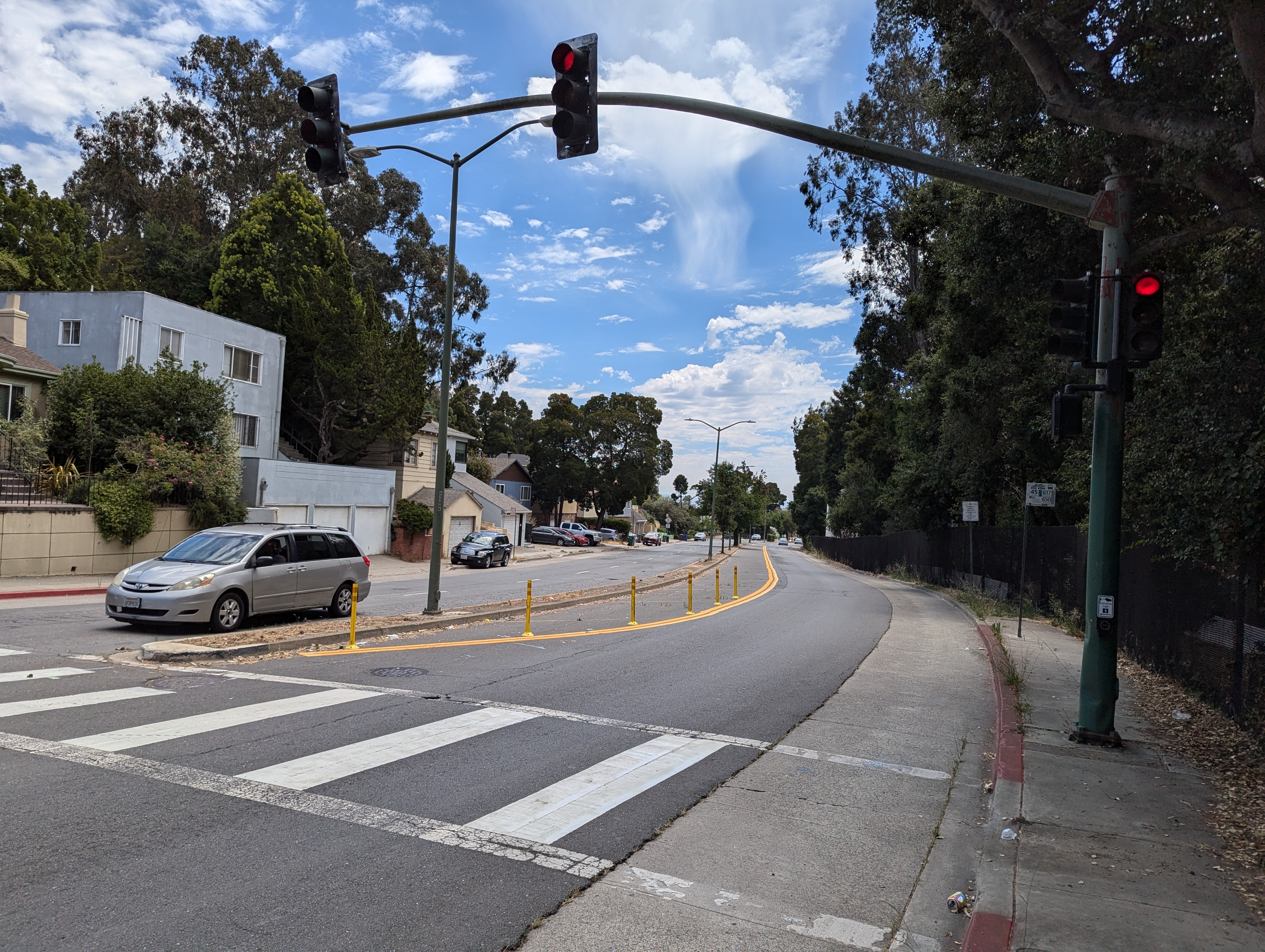 New plastics posts along the painted median on the downhill side of Seminary Avenue at Outlook Avenue, installed as part of the Rapid Response Program